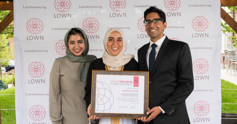 Dr. Altaf Saadi (center) with her sister (left) and husband (right)