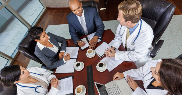 Medical Business Team Meeting in Boardroom